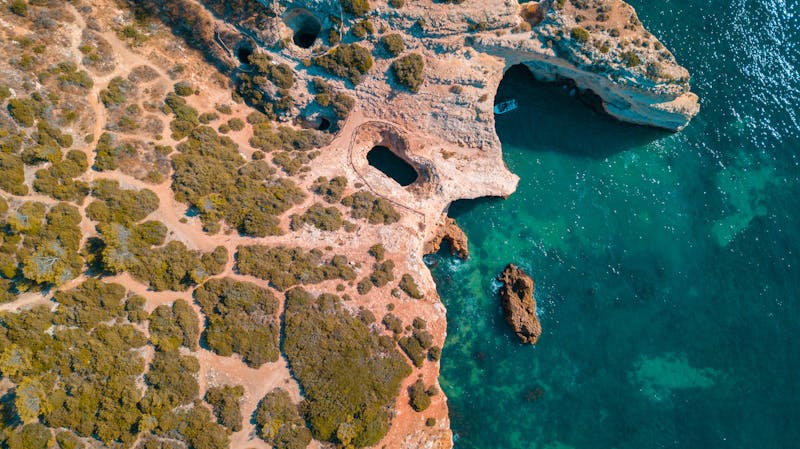 Dramatic golden cliffs and ocean view in the Algarve, Portugal