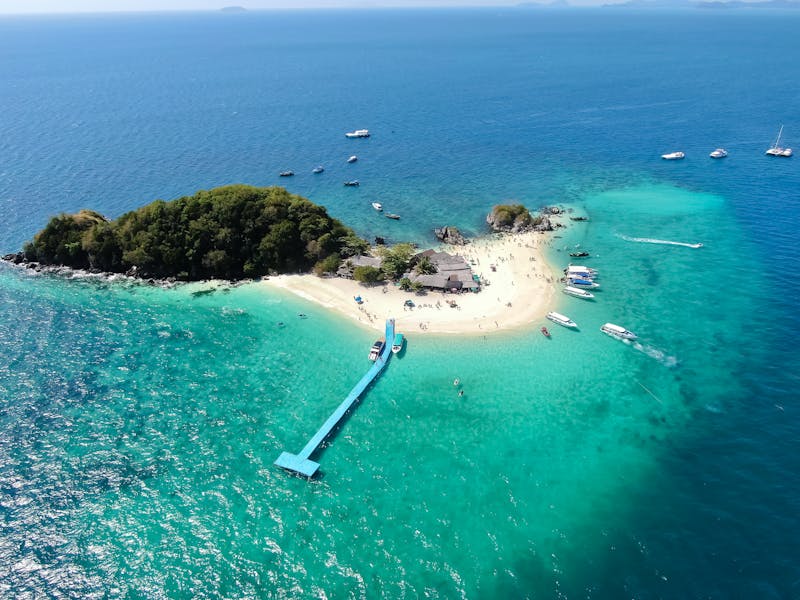 Tropical beach with wooden pier in Khao Lak, Phuket, Thailand